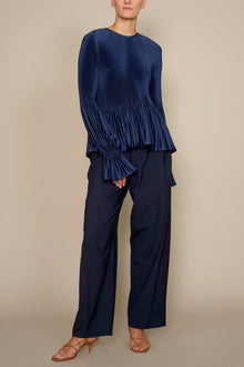 Kallmeyer Navy Crepe pleat and release romance top found at Patricia in southern Pines, NC