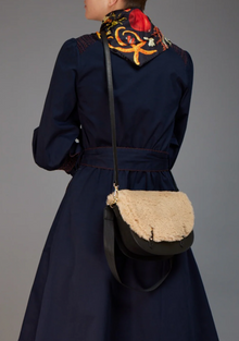  Love Binetti Santos bag in black leather and natural shearling found at Patricia in Southern Pines, NC