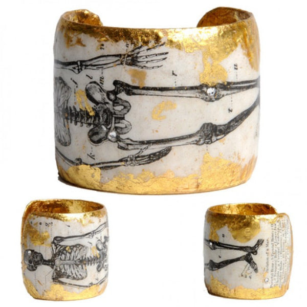 Beautiful Evocatuer 22K gold leaf cuff with 1895 skeletal image, available from Patricia.