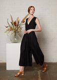 women's romper with long pants and deep v-neck in black