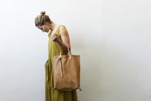  8.6.4 Design Tan Leather Tote
