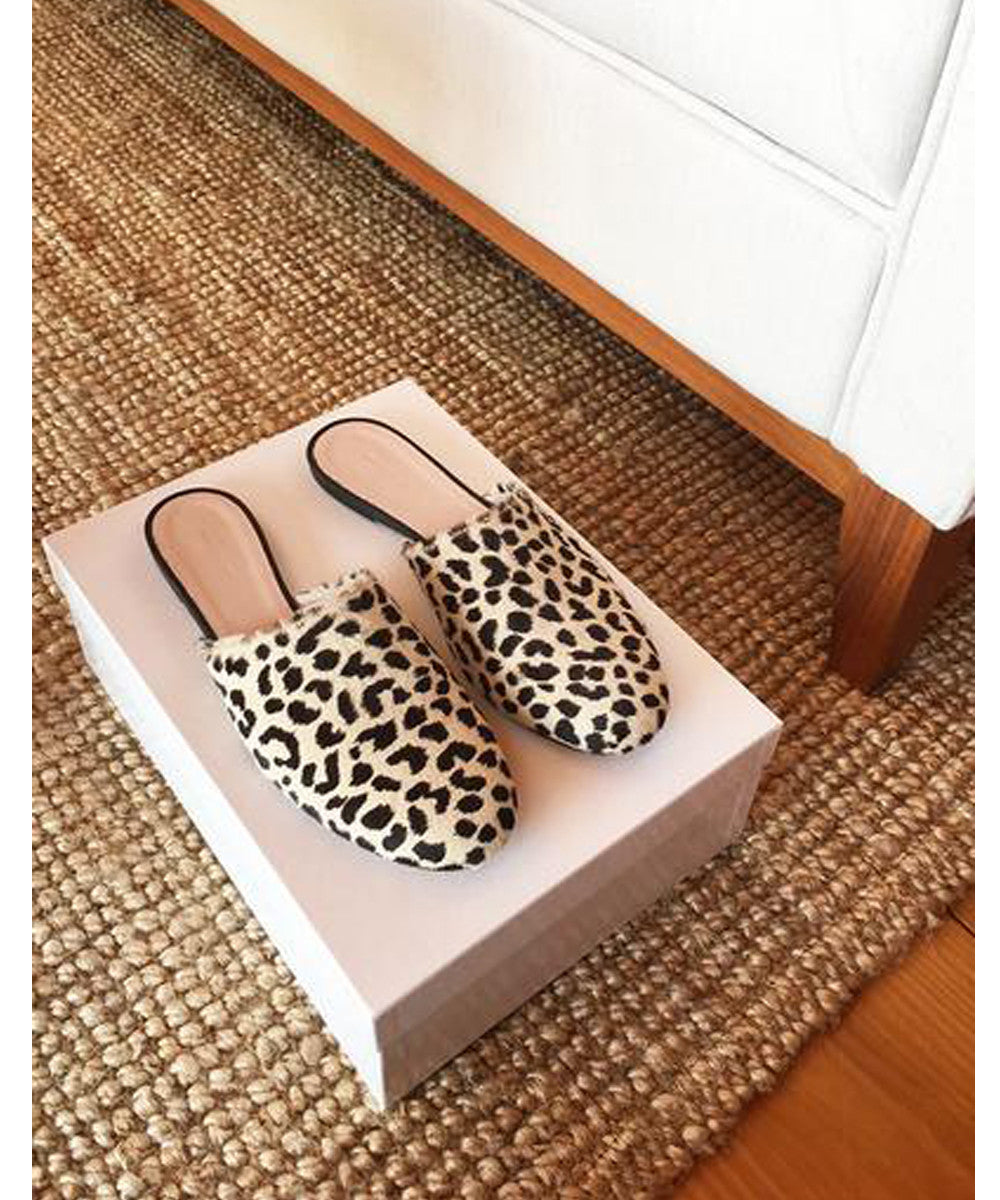 Emerson Fry Leopard Emerson Slides. Find these shoes at PATRICIA. A boutique in Southern Pines, NC dedicated to modern, classic, minimal styles.