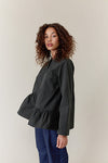 Shosh girl shirt with asymmetrical ruffle found at PATRICIA in Southern Pines, NC. 