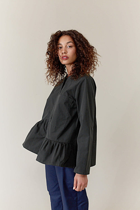 Shosh girl shirt with asymmetrical ruffle found at PATRICIA in Southern Pines, NC. 