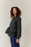 Shosh girl shirt with asymmetrical ruffle found at PATRICIA in Southern Pines, NC. 