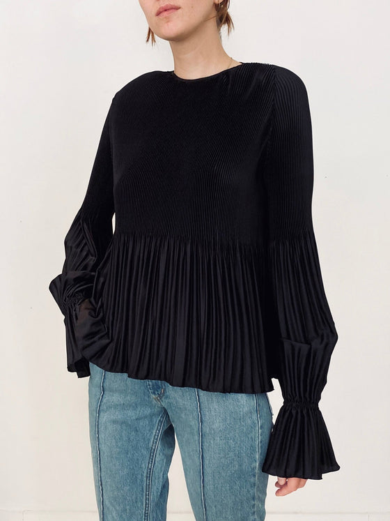 Kallmeyer Black Crepe pleat and release romance top found at Patricia in southern Pines, NC