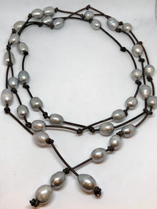  long oval pearls on leather 