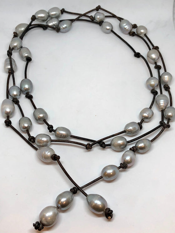 long oval pearls on leather 