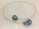 This light and airy necklace features two grey freshwater pearls on a wire choker. The wire is Sterling Silver with 22kt gold vermeil.