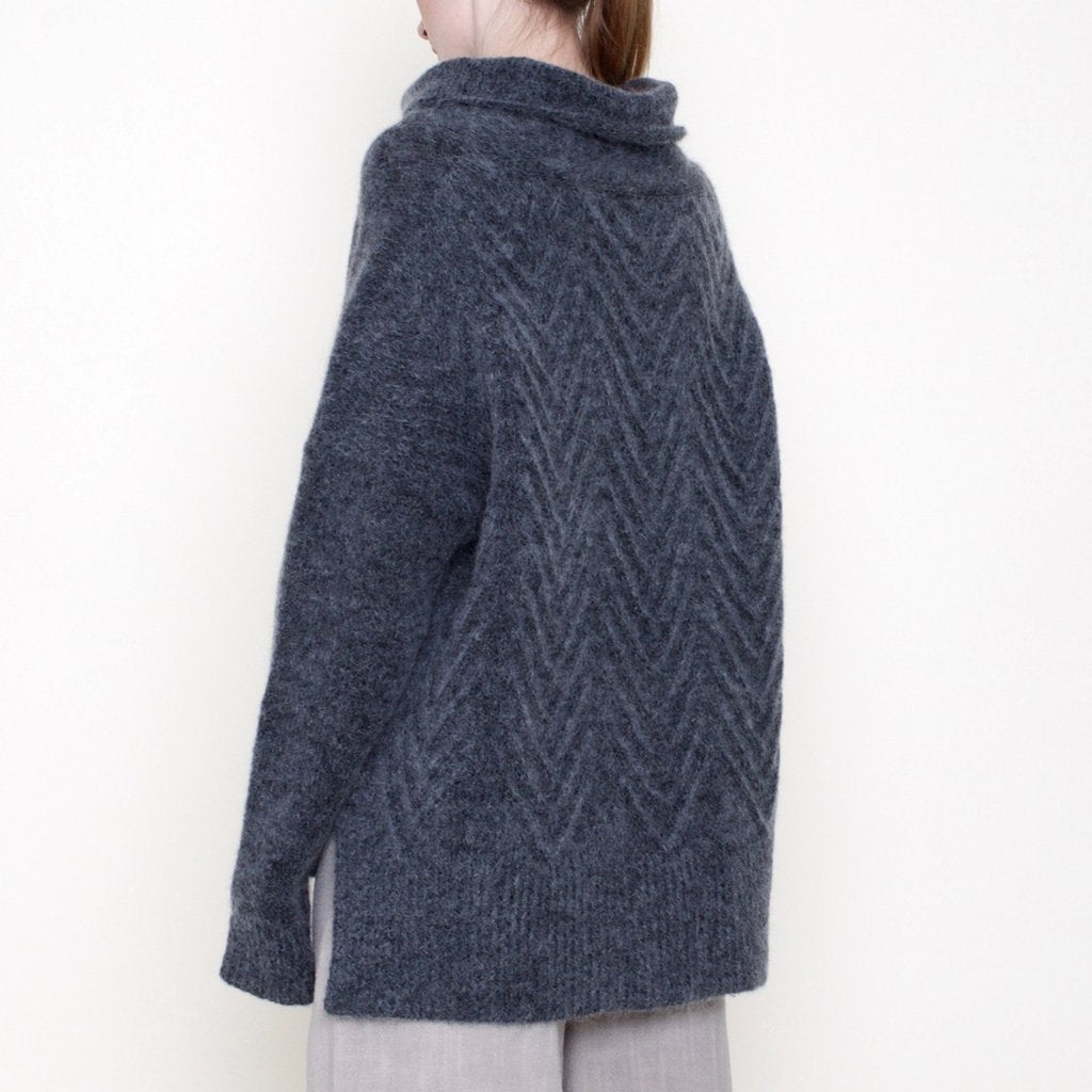 7115 by Szeki Chevron Funnel Neck Sweater found at PATRICIA in Southern Pines, NC. 