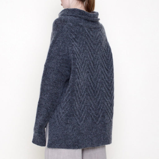7115 by Szeki Chevron Funnel Neck Sweater found at PATRICIA in Southern Pines, NC. 