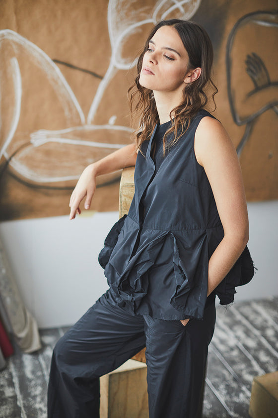 Black blouse with double sided peplum