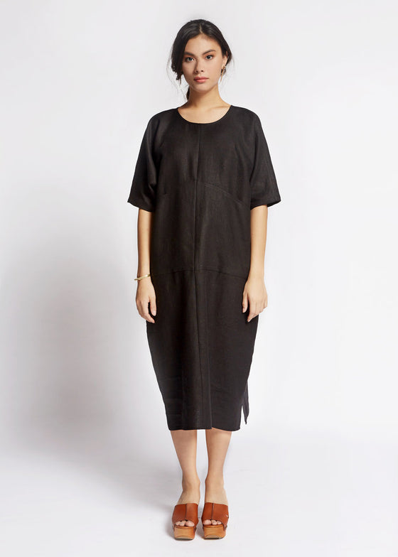 100% black linen dress with front pocket detail and baggy fit, short sleeves found at Patricia in Southern Pines and Raleigh, NC