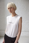 Minimalist Inessa White Luxe Logo Shoulder Pad Tee