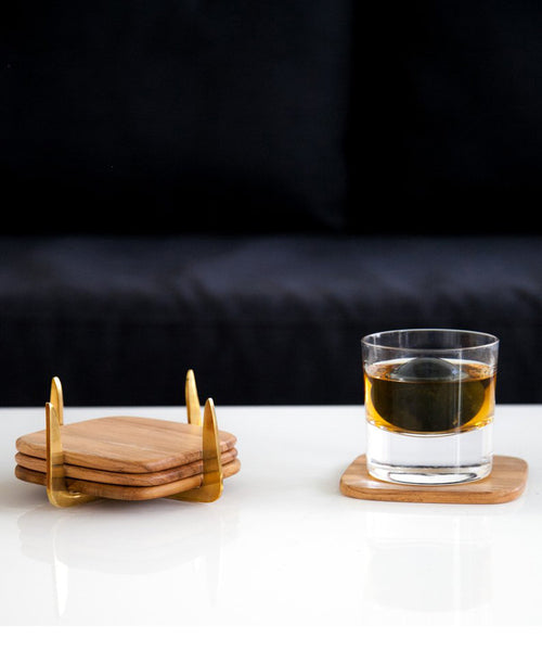 Pure Brass & Teak Coaster Set by Rose & Fitzgerald at PATRICIA in Southern Pines, NC