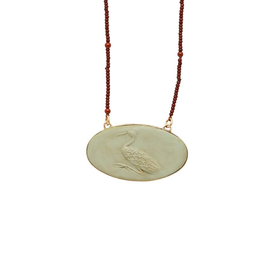Julie Cohn Crane cameo clay pendant found at Patricia in Southern Pines, NC