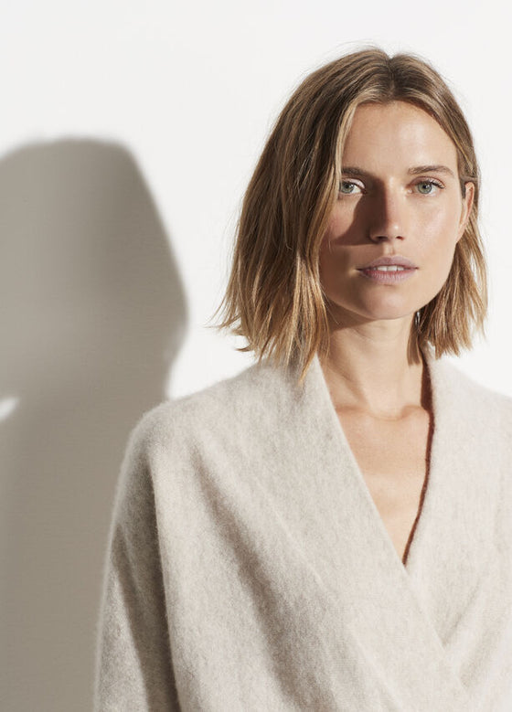 Vince Cashmere Wrap Front Pullover in black or heathered oat found at PATRICIA in Southern Pines, NC