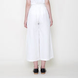 wide legged white linen trousers viewed from the rear