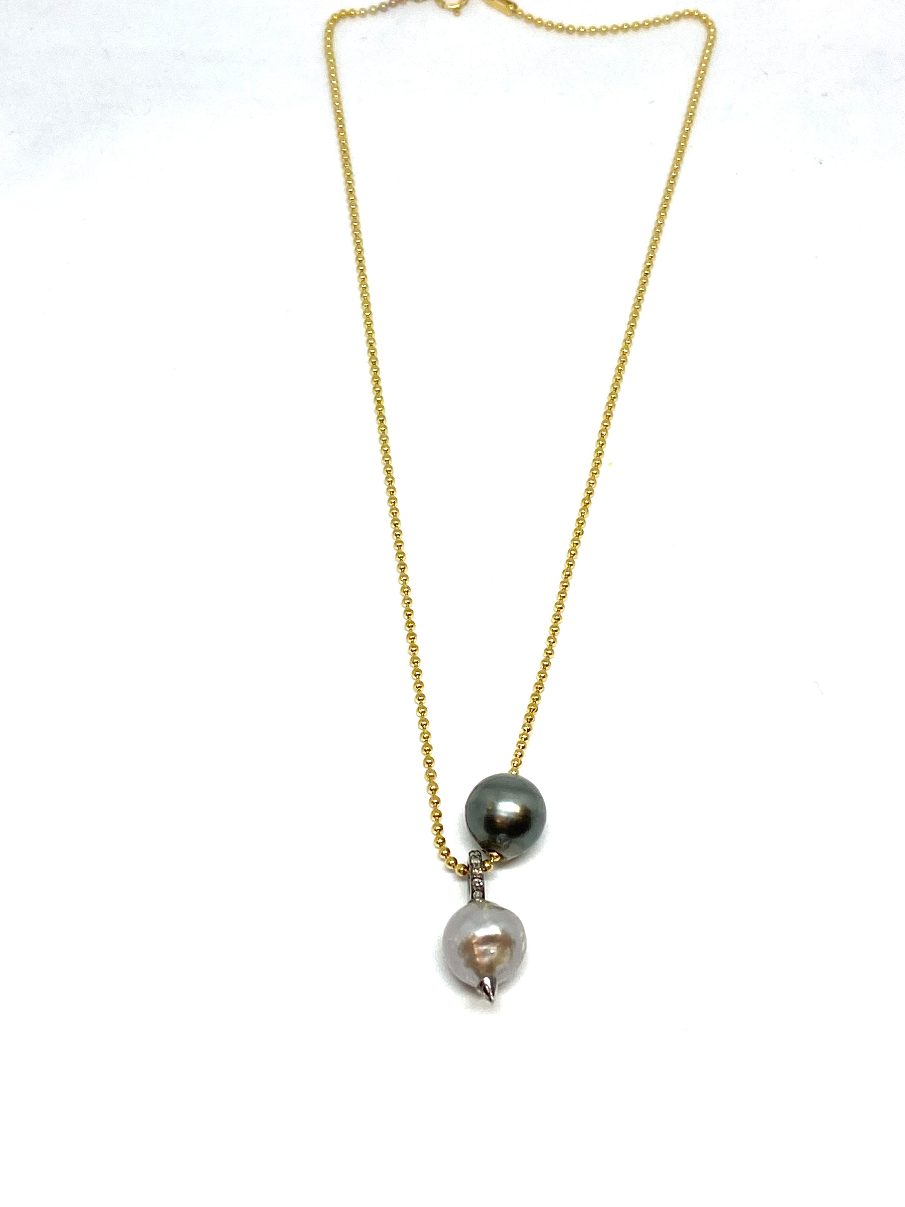 Nathan and moe chain necklace with Tahitian pearl and Baroque pearl pendant found at Patricia in southern pines, nc