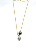 Nathan and moe chain necklace with Tahitian pearl and Baroque pearl pendant found at Patricia in southern pines, nc